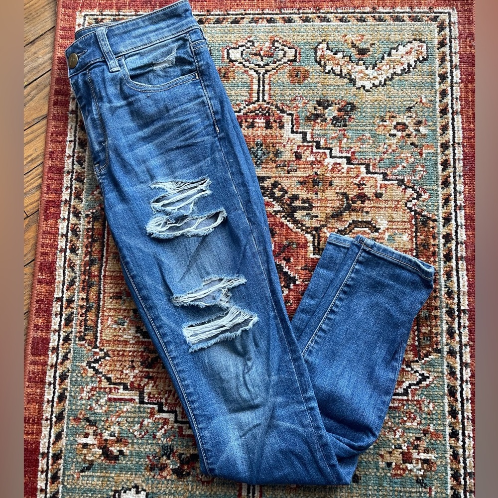 American Eagle distressed blue denim.